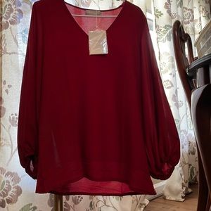 Red blouse. Never been word and new with tags!